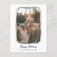 a christmas card with an image of three women in knitted hats and the words happy holidays