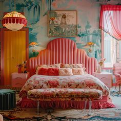 a bedroom decorated in pink and gold with an upholstered bed