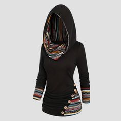 Mit diesem lässigen und doch modischen Kapuzenpullover können Sie Komfort und ethnischen Stil verbinden. Der Tribal-Print, der wendbare Kapuzenkragen, kombiniert mit bunten Streifen und Knopfdetails, ist ein echter Hingucker für einen stilvollen Look. Kapuze und Kragen sind wendbar Einzigartiger ethnischer Stil Weicher und bequemer Stoff Hochwertige Qualität Slim Fit Hoodie, Casual Wear Women, Knitted Hood, Ethnic Print, Style Hoodie, Black Women Fashion, Hooded Tops