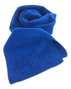 For a more subtle yet contemporary look, our music staff design is laser etched on this royal blue fleece scarf.   Made from anti-pill fleece fabric and so, so soft.  Generously sized at 10"x 60".  Finished edges in matching color  Ultra thermal Musical notes are laser etched into the fleece Conveniently machine washable. More colors available - see our other listings.  A Making Life Musical product exclusively at The Music Depot. Staff Design, Fleece Scarf, Musical Notes, Laser Etching, Music Notes, Fleece Fabric, Winter Scarf, Color Matching, Etching