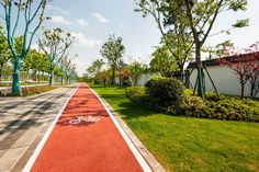 a bike path is painted red and white