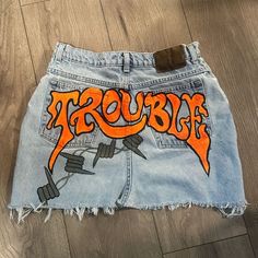 Fits With Mini Skirt, Custom Skirt Paint, Patchwork Skirt Denim, Orange Denim Bottoms For Spring, Spring Orange Denim Bottoms, Denim Painting Jeans, Bratz Fashion Inspiration, Custom Jean Skirt, Painted Jeans Ideas