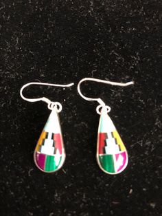 * Handmade item *925 Sterling silver * Gemstone: Colorful Inlay *Dangle drop Earrings *Free gift box *Free shipping in USA *Ready to ship *Thank you for looking and check out more items in my Etsy shop for more great items and deals! *Https://www.etsy.come/shop/abq925 Multicolor Sterling Silver Nickel-free Earrings, Nickel-free Multicolor Sterling Silver Earrings, Colorful Teardrop Jewelry As Gift, Multicolor Sterling Silver Drop Earrings, Southwestern Silver Dangle Teardrop Earrings, Silver Southwestern Style Teardrop Dangle Earrings, Southwestern Green Teardrop Earrings, Artisan Multicolor Long Drop Jewelry, Nickel-free Southwestern Teardrop Earrings For Gifts