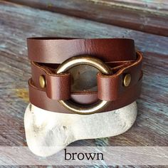 The Petite Leather and Brass Bracelet | Brown | Black | English Tan | Natural | Cocoa, Leather Wrap Brown Leather Bracelets With Brass Hardware, Adjustable Brown Leather Bracelet With Brass Hardware, Adjustable Double Band Brown Wrap Bracelet, Adjustable Double Band Leather Bracelet, Modern Adjustable Jewelry With Brass Hardware, Adjustable Double Band Jewelry With Leather Strap, Adjustable Double Band Leather Strap Jewelry, Modern Brown Adjustable Wrap Bracelet, Modern Adjustable Brown Wrap Bracelet