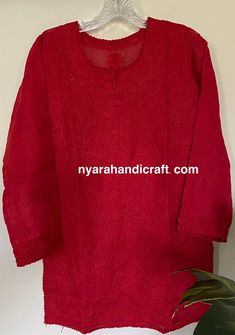 "Soft cotton Chikankari hand embroidered blouse. Matching liner Included. Length: 30 inches Color: Red \"Embroidery designs vary \"" Traditional Red Top With Chikankari Embroidery, Red Cotton Top With Chikankari Embroidery, Unstitched Red Fabric With Chikankari Embroidery, Traditional Red Chikankari Embroidered Fabric, Unstitched Red Chikankari Embroidered Fabric, Peach Blouse, Navy Blue Blouse, Short Blouses, Red Embroidery