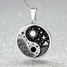 Sun and Moon Necklace, offering engraved personalization and an 18K Gold Plated option, is a unique piece of Celestial Jewelry. This Yin Yang Pendant, inspired by Chinese symbolism, represents balance. It's more than just an accessory, it's a charm that embodies the harmony of the universe, making it a perfect Space Birthday Gift. ➜ Our Celestial Jewelry is made of high quality surgical steel with a graphic image that's printed directly onto the steel surface with a shatterproof liquid glass coa White Sun And Moon Design Round Necklace, White Round Necklace With Sun And Moon Design, White Sun And Moon Design Round Pendant Jewelry, White Sun And Moon Round Pendant Jewelry, Symbolic Sun And Moon Design Jewelry Gift, Symbolic Sun And Moon Jewelry Gift, White Sun And Moon Design Jewelry Gift, White Sun And Moon Design Jewelry For Gift, Black Necklace With Sun And Moon Design As Gift