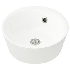 a white round sink on a white background