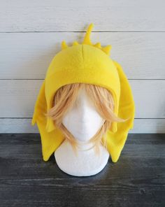 These hats are made from fleece and interfacing in the ears, but still allows for some floppiness and do not stand up (sorry but I do not offer this option). ⫸ Perfect for: fans, cold weather, costumes, or conventions. Very warm! ⫸ Size: Fits anyone age 5+, one size fits most. Circumference about 24-25 in.⫸ Care instructions: I recommend hand wash but should be fine in machine wash cold. ⫸⫸Yellow is the only version not made when ordered.All hats are made in a smoke-free, pet-free environment. A Novelty Costume Cap Hat, Adjustable Beanie Hat For Cosplay, Adjustable Beanie For Cosplay, Halloween Cosplay Beanie Hat, Winter Costume Party Cap Hats And Headpieces, Themed Fitted Hat For Cosplay, Costume Cap For Winter Party, Adjustable Hats For Winter Costume, Adjustable Winter Hats For Costume Events