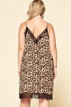 Leopard printed sleeveless slip dress featuring an adjustable spaghetti strap and eyelash ace edge trim. Spring Cami Slip Dress With Lace Trim, Spring Camisole Slip Dress With Lace Trim, Spring Loungewear Slip Dress With Spaghetti Straps, Spring Printed Slip Dress With Spaghetti Straps, Fall Camisole With Spaghetti Straps, Chic Printed Slip Dress With Spaghetti Straps, Chic Summer Sleepwear With Spaghetti Straps, Spring Spaghetti Strap Slip Dress For Sleep, Spring Slip Dress With Lace Trim And Spaghetti Straps