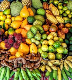 there are many different types of fruits and vegetables on the table together in this picture