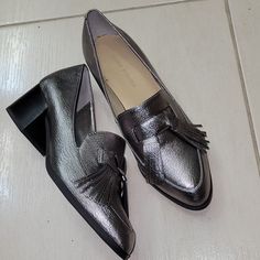 Marc Fisher Silver Gray Loafers. Brand New Silver Round Toe Loafers For Party, Silver Loafers With Round Toe For Party, Silver Party Loafers With Round Toe, Silver Heels For Office In Spring, Silver Slip-on Heels For Formal Occasions, Silver Closed Toe Leather Loafers, Silver Leather Closed Toe Loafers, Silver Round Toe Loafers For Spring, Silver Round Toe Loafers For Work