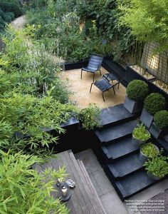 an aerial view of a garden with stairs