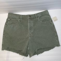 New With Tags Free People We The Free Army Green Distressed Denim Shorts In Size 31. Button Fly. Slits On Sides Of Legs. White Thread At Bottom Of Left Leg. See Photos For Measurements. El Ripped Green Cotton Bottoms, Casual Green Cutoff Jean Shorts, Casual Green Cutoff Shorts, Green Shorts With Frayed Hem, Green Bottoms With Frayed Hem In Short Length, Trendy Green Cutoff Jean Shorts, Green Cutoff Shorts With Pockets, Green Cutoff Cotton Jean Shorts, Green Cotton Cutoff Jean Shorts