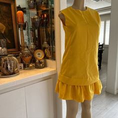 Vintage 60s 70s Canary Yellow Dress Cottagecore Dropwaist Pleated Vtg Glenbrooke Simply Stunning Please Feel Free To Make An Offer Or Bundle To Save !! Please Note This Item Is Vintage And We Suggest The Range Of Listed Sizes For Best Fit. Preowned, See Photos For Measurements Highend Estate, Rockabilly, Grunge, Prairie, Secretary, Pinup, Mod, Hippie, Floral Power, Party Dress, Off-White, Handmade, Custom, One Of A Kind, Mid Century Modern, Color Block, Unionmade, Cottoncore, Goth, Flowy, 3d, Ge Retro A-line Vintage Dress For Work, Retro Cocktail Mini Dress, Retro Sleeveless Cocktail Vintage Dress, Retro Mini Dress With Ruffles, Mid-century Knee-length Vintage Dress For Spring, Mid-century Vintage Knee-length Dress For Spring, Mid-century Style Knee-length Vintage Dress For Spring, Retro A-line Dresses For Daywear, Retro A-line Mini Dress For Work