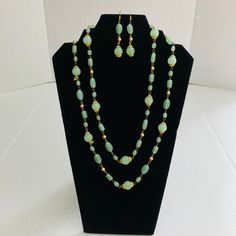 Nice Set in excellent vintage condition.  Necklace can be worn as one strand or two. Elegant Green Jewelry For Vintage Events, Vintage Double Strand Jewelry For Formal Occasions, Elegant Vintage Jewelry With Round Beads, Retro Green Jewelry For Vintage Events, Retro Jewelry With Matching Earrings For Vintage Collection, Green Vintage Jewelry, Green Vintage Jewelry For Vintage Events, Vintage Green Jewelry For Vintage Events, Vintage Green Dangle Jewelry