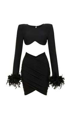 The AUBRIE two piece set is crafted from our luxe bandage fabric. This style features a bralette bustier top and a V high waisted mini skirt that sits right on the waist to accentuate the silhouette. A statement piece designed for the glamorous holiday parties! Black Stretch bandage Long sleeve Bralette feather detailing on the sleeves Shoulder Padded High waisted V Mini Skirt Skirt: Invisible side zipper Dry clean only Designed in USA Model wears a size Small Model is 5'10” tall and weights 130 Chic Mini-length Two-piece Party Dress, Chic Bodycon Crop Top For Party, Chic Bodycon Crop Top For Night Out, Black Bandage Crop Top For Party, Black Two-piece Party Dresses, Black Two-piece Dress For Party, Chic Black Two-piece Crop Top, Chic Club Bandage Crop Top, Chic Bandage Crop Top For Club