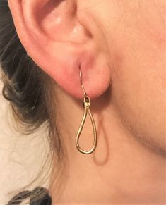 This beautiful 14 Karat Yellow Gold Handmade Tear Drop Earring is all handmade by Carolyn. It features artifact like looks both sides differ from each other. Unique design for stylish women. Total weight of 14K gold is 1.5 grams. Pair of earring Dimensions 25x10mm Can be ordered in rose or white gold. Due to the nature of hadmade products and computer screens, actual product may slightly differ from the one featured in the picture. Yellow Gold Sterling Silver Teardrop Earrings With Ear Wire, 14k Gold Long Drop Earrings For Everyday, Yellow Gold Teardrop Earrings, Everyday 14k Gold Long Drop Earrings, Gold Teardrop Linear Earrings As Gift, Yellow Gold Teardrop Linear Earrings For Everyday, Everyday Yellow Gold Teardrop Linear Earrings, Gold Teardrop Pendant Earrings For Everyday, 14k Gold Filled Elegant Teardrop Earrings