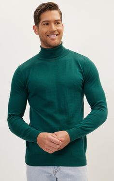 DETAILS Elevate your style with our clean roll neck knit sweater, crafted from a finely textured cotton acrylic blend. Featuring a roll neck and an elegant smooth finish, this sweater is a must-have for the modern man's wardrobe. It's both cozy and versatile, perfect for layering with any of our wool suits to achieve a modern and polished look. Stay sharp and sophisticated effortlessly.SIZE + FITMuscle fit, to find your correct size use the "What's my size" button. COMPOSITION50% Cotton 50% Acry Green Turtleneck Sweater With Ribbed Cuffs, Classic Fitted Green Polo Sweater, Green Fitted Classic Polo Sweater, Fitted Classic Green Polo Sweater, Classic Green Sweater With Ribbed Collar, Classic Solid Knit Turtleneck, Solid Fine Knit Turtleneck, Green High Neck Sweater With Stretch, Green Turtleneck Top With Ribbed Cuffs