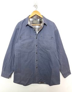 This shirt has small marks on the lower front + back sides and on the right sleeve. (please see photos for flaws) Measurements pit to pit: 24 inches  Top to bottom: 31 inches Relaxed Fit Cotton Flannel Shirt With Snap Buttons, Casual Cotton Flannel Shirt With Snap Buttons, Outdoor Cotton Flannel Shirt With Button Closure, Outdoor Cotton Button-up Flannel Shirt, Casual Outdoor Shirt With Snap Buttons, Outdoor Cotton Flannel Shirt With Buttons, Outdoor Cotton Top With Snap Buttons, Cotton Top With Snap Buttons For Outdoor, Vintage Cotton Shirt For Outdoor