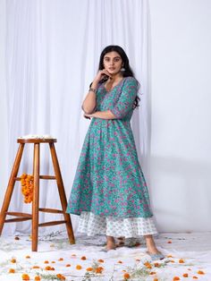 For the upcoming wedding season this suit set is a perfect to wear in morning mehndi or roka function. It comes with a V-neck detailing, giving it a rich look. It is paired with a beautiful hand-block printed dupatta giving it a complete elegant look. 100% Premium Cotton Printed Suit Set Hand-block Printed Dupatta Comfort fit Set Contents: 1 Kurta, 1 Dupatta, 1 Palazzo Model height is 5.7 feet and is wearing size M Wash Care Instructions: Dry Clean Only Note: The product will be delivered within Green Anarkali Set With V-neck, Fitted V-neck Kurta For Navratri, V-neck Anarkali Set For Diwali, Green V-neck Set For Diwali, Festive Floral Print V-neck Palazzo Set, Festive V-neck Floral Print Palazzo Set, Semi-stitched V-neck Kurta, Fitted V-neck Anarkali Set For Navratri, Fitted V-neck Kurta For Diwali