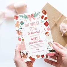 someone holding up a birthday card that says oh what fun to be one