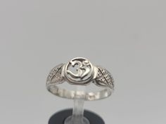 Vintage 925 Silver OM, OHM, AUM Sound of the Universe Symbol Talisman Ring Size 9.5 Item w#921 Clean and in good condition  Ring can be sized by your local jeweler or silversmith 2.4 grams Welcome to Westgate Jewels!! We specialize in vintage estate, designer, and fine jewelry. Our shop consists of items that are estate, antique, and / or vintage conditions unless otherwise noted. This means that most items are prior owned and may have some imperfections such as light scratches, scuffs, and / or Adjustable Hallmarked Spiritual Signet Ring, Symbolic Adjustable Engraved Hallmarked Ring, Symbolic Adjustable Engraved Ring With Hallmark, Symbolic Silver Hallmarked Rings, Spiritual White Gold Ring Stamped 925, Universe Symbol, Talisman Ring, Bethlehem Pa, The Age