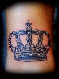 a tattoo with a crown on it