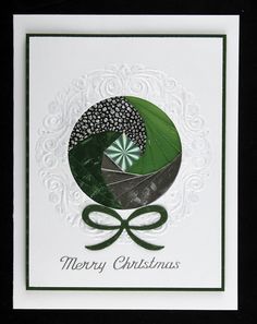 a christmas card with an image of a green umbrella