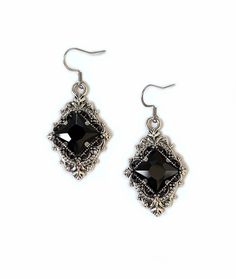 "These richly detailed antiqued silver plated filigree earrings, are adorned with dazzling JET BLACK glass rhinestones that perfectly accentuate a larger jewel in the center of each. Earrings measure 2\" tall, including stainless steel earring hooks, and are 1\" wide. Listing is for earrings ONLY. Matching necklace is available in our store. These are available in a variety of stone colors in our store, along with matching necklaces. If you don't see something available in a stone color you'd li Antique Silver Earrings, 1920's Style, Rainbow Topaz, Earrings Gothic, Gothic Earrings, Gothic Accessories, Choker Pendant, Filigree Earrings, Onyx Earrings