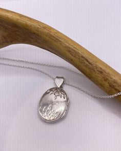 "Vintage oval locket  925 sterling silver  About a 3/4 an inch long without bale.  on a 925 sterling silver chain 16, 18 ,20, 22\" or 24\" Lovely etched design Can hold tiny sized photo. Laminate photo before inserting for longevity  Thank you for supporting a veteran owned, small business! All jewelry is shipped free within the US in a stylish gift box" Luxury Sterling Silver Pendant Locket Necklace, Cheap Silver Locket Charm Necklace, Heirloom Sterling Silver Locket Necklace, Sterling Silver Pendant Locket Necklace With Polished Finish, Sterling Silver Locket Necklace With Polished Finish, Classic Nickel Free Locket Necklace For Gift, Classic Nickel-free Locket Necklace Gift, Engraved Sterling Silver Locket Necklace, Hallmarked Sterling Silver Locket Necklace