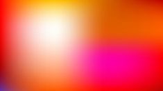 an abstract blurry background with red, yellow and blue colors