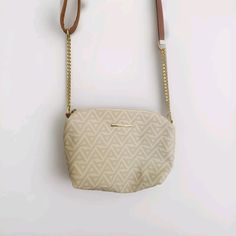 This Aldo Women's Crossbody Purse Shoulder Bag in Cream is the perfect accessory for any outfit. With a zip closure and faux leather and metal handle/strap material, this bag is both stylish and functional. The small size makes it great for carrying your essentials while on-the-go. New without tag.. Crossbody Purse, Purses Crossbody, Bags Handbags, Shoe Accessories, Faux Leather, Bag Lady, Purse, Women Accessories, Shoulder Bag