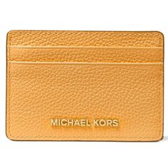 Upgrade your essentials with the Michael Kors Women's Jet Set Leather Card Holder. Crafted from premium leather with a polyester lining, this card holder offers both style and durability. The stylish gold-tone exterior hardware adds a touch of elegance to your everyday carry. Size: 3-3/4"W x 2-3/4"H x 1/10"D..  Color: Yellow.  Gender: female.  Age Group: adult. Gold Leather Wallet With Card Slots, Michael Kors Rfid Blocking Rectangular Wallet, Michael Kors Wallets With Card Slots, Michael Kors Rfid-blocking Rectangular Wallet, Michael Kors Wallets With Card Slots For Daily Use, Michael Kors Rfid-blocking Wallet, Classic Gold Leather Card Holder, Modern Michael Kors Rectangular Wallets, Michael Kors Gold Wallet For Everyday Use