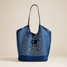 The Tokyo Shopper - Navy/Black Chic Navy Travel Bag, Elegant Summer Travel Shoulder Bag, Chic Navy Bag With Leather Handles, Chic Navy Bags With Leather Handles, Elegant Navy Shoulder Bag With Leather Handles, Elegant Navy Travel Bags, Luxury Summer Bags For On-the-go, Luxury Summer Shoulder Bag For On-the-go, Navy Shoulder Bag With Dust Bag For Travel