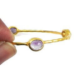 Fluorite Bangle, Fluorite Bracelet, Purple Bangle, Hammered Bangle, Brass Bangle, Gold Bangle, Bangle Bracelet, Women's Bangle Jewelry Description : ~ Material : Brass & Gemstone ~ Gemstone : Fluorite ~ Bangle Size : 58 MM ~ Weight : 7.69 Gram Approx ~ Stone Size : 8 x 6 MM Approx ~ Setting Type : Bezel ❣❣ Handmade Item ❣❣ **Made to Order** » G EM S T O N E D E T A I L « **Gemstone structure may vary from the image as two gemstones do not have the same structure** If you want to see the pict Fluorite Bracelet, Hammered Bangles, Womens Bangles, Simple Bangle, Bangle Gold, Brass Bangle, Bangle Jewelry, Gold Bangle, Quartz Bracelet