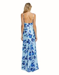 Our Floral Print Cami Slip Gown—a versatile and effortlessly chic addition to your wardrobe. This gown features a delicate cami-style silhouette adorned with a vibrant floral print, perfect for embracing the beauty of warmer days. With its lightweight and flowy design, it's ideal for both casual outings and special occasions. Ieena for Mac Duggal Printed Charmeuse Fabric (100% polyester) Fully lined V-neck Sleeveless Low back Concealed back zipper Approx. 62.5" from top of shoulder to bottom hem Spring Floral Print V-neck Gown, Spring Wedding Printed Maxi Dress, Fitted Floral Print Gown For Spring, Spring Gown With Spaghetti Straps, Chic Floral Print Gown For Formal Occasions, Printed Maxi Dress For Spring Wedding, Blue Floral Print Evening Dress, Blue Floral Print Dress For Evening, Blue Floral Dress For Evening