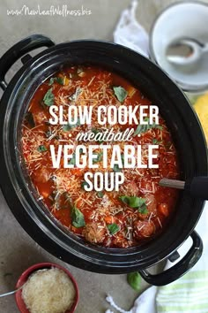 slow cooker meatball vegetable soup is ready to be eaten