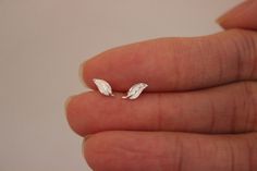 Tiny Leaf Stud Earrings, Sterling silver Stud Earrings, Tiny Stud Earrings, Botanical, Fall, silver Earrings by GreatJewelry4All on Etsy https://www.etsy.com/listing/211230776/tiny-leaf-stud-earrings-sterling-silver Minimalist Silver Leaf Earrings, Silver Leaf Minimalist Earrings, Silver Leaf-shaped Minimalist Earrings, Simple Small Silver Earrings, Simple Tiny Silver Cartilage Earrings, Minimalist Leaf-shaped Sterling Silver Earrings, Minimalist Sterling Silver Leaf-shaped Earrings, Leaf Earrings Stud, Tiny Necklace