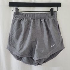 New With Tags. Tags: Built In Underwear/Shorts Nike Gray Stretch Shorts, Nike Gray Athletic Shorts, Gray Workout Shorts For Spring, Nike Athletic Shorts, Nike Fleece, Nike Running Shorts, Orange Shorts, Purple Shorts, Shorts Nike