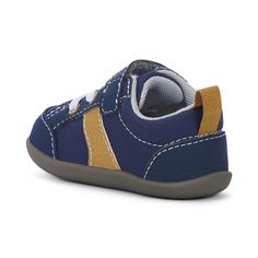 Channel their sporty side with this court-inspired Connor first walker. Beyond the ultra-cool retro look, the wide opening allows easy on-off and the recycled rubber outsole adds traction to ensure they’re supported with every first step they take. Details: Soft navy canvas upper with nubuck-feel overlays and an extra durable rubber toe cap to protect little toes. Recycled mesh lining and sockliner keeps feet dry and fresh. Recycled TPR rubber outsole provides flexibility, traction, and durabili Casual Scratch-resistant Sneakers For Playtime, Sporty Non-slip Sneakers For Playtime, Sporty Sneakers With Rubber Sole For Playtime, Non-slip High-top Sneakers For Playtime, Sporty High-top Sneakers For Playtime, Non-slip Low-top Sneakers For Playtime, Sports Sneakers With Soft Synthetic Sole, Low-top Running Sneakers With Soft Sole, Sports Sneakers With Soft White Sole