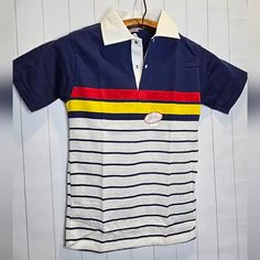 Perfect Condition Vintage Polo Shirt Kids Size 14 B3 Casual Blue Shirt With Contrast Stripes, Blue Cotton Shirt With Contrast Stripes, Cotton Color Block Collared Top, Multicolor Cotton Polo Shirt With Striped Collar, Casual Blue T-shirt With Striped Collar, White Collared Shirt With Contrast Stripes, Blue Cotton Top With Contrast Stripes, White Color Block Polo Shirt, Striped Color Block Cotton T-shirt