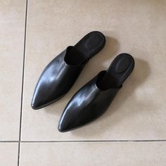 "Flat Leather Shoes Black Mules, Leather Mules, Women Shoes, Leather Sandals, Slip On, Black Pointed Mules, Women's Closed toe Sandals ------------------------------ We use the finest leather and the most comfortable shoe shape. We use a manufactured durable sole so that you can enjoy the most out of these gorgeous shoes. All of our shoes are handmade, created with careful attention to comfort, detail and style. ------------------------------ Sandals Details: * Color - Black * Upper Materials: L Black Leather Slip-on Heels, Black Open Toe Mules With Leather Footbed, Black Closed Toe Heels With Rubber Sole, Black Leather Slip-on Mules, Black Mules With Leather Sole, Black Open Toe Mules With Leather Sole, Black Leather Shoes With Pointed Toe And Removable Insole, Black Leather Open Toe Mules, Black Leather Sole Slip-on Sandals