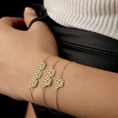 Introducing our 18k Gold Plated Engraved Paw Print Name Bracelet, where cherished memories and style unite.  DETAILS: ❥Material: 925k sterling silver ❥Color:  Silver, Gold, Rose Gold ❥Finish: Polished ♡ You can choose from several lengths of bracelet: 4-4,5 5-5,5 6-6,5 7-7,5 8-8,5" - during your order you can select your preferred bracelet length from the dropdown menu. ♡ HOW TO ORDER ❥Select the options that you want from the dropdown menu ❥Add to cart and proceed to checkout ❥Do not forget to Personalized 14k Gold Hypoallergenic Bracelets, Yellow Gold Jubilee Bracelet Jewelry For Mother's Day, Personalized Hypoallergenic Yellow Gold Bracelets, Yellow Gold Chain Bracelet For Mother's Day, 14k Gold Mother's Day Bracelet, 14k Gold Bracelet Jewelry For Mother's Day, Adjustable Tarnish Resistant Bracelets For Mother's Day, Sterling Silver Bracelet For Best Friend, Personalized Yellow Gold Bracelet As Gift