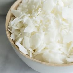 white rice is in a bowl on the table