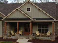 a house with chairs on the front porch