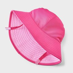 Beat the summer heat with this Toddler Girls' Reversible Bucket Hat - Cat & Jack™ Pink. Made from lightweight recycled polyester, it gives a cool and stylish vibe. The reversible design adds versatility, while the pull-on closure makes it hassle-free. Perfect for toddlers, this bucket hat is a practical and chic addition to your kid's wardrobe. Cat & Jack™: Designed for all children so you can trust it's made for yours. Adjustable Sun Hat With Upf 50+ For Play, Trendy Pink Sun Hat With Upf 50+, Summer Waterproof Adjustable Hats, Adjustable Fit Bucket Hat With Uv Protection For Playtime, Adjustable Bucket Hat With Uv Protection For Playtime, Adjustable Upf 50+ Bucket Hat For Playtime, Adjustable Waterproof Summer Hats, Pink Adjustable Sun Hat For Summer, Adjustable Fit Pink Sun Hat For The Beach