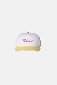 You can never have too many. The Script Trucker Cap has a high crown design with a snapback closure. The front features our Elwood logo in cursive. Available in Red/White, Yellow/White, and Blue/White. 70 DENIER INTERLOCK, 3 OZ FOAM FRONT WITH ELWOOD EMBROIDERY MESH TOP PLASTIC SNAP STRIP ADJUSTER White Retro Snapback Hat With Curved Brim, Retro White Snapback Hat With Flat Brim, White Retro Snapback Trucker Hat, Retro White Fitted Hat With Curved Brim, Retro White Snapback Baseball Cap, Retro Yellow Trucker Hat With Curved Brim, Retro Yellow Curved Brim Trucker Hat, White Retro Baseball Cap For Streetwear, Retro White Dad Hat