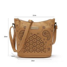 We all love our classic designs. However, there are days when you just want to step out of your comfort zone and try something new. This stunningly unique hobo faux leather tote shoulder handbag is precisely the kind of innovation we are talking about. Featuring beautiful and intricate artwork, this charming design is the definition of boho chic. The design reflects exquisite detailing and looks and feels deluxe. This lightweight and durable bag can be sported with all kinds of outfits making it incredibly versatile and handy. The adjustable padded shoulder strap adds to the bag's utility and makes it easy to carry. Made with the finest quality faux leather on the market, this bag feels softer and is more durable than real leather. If you think this bag is only intended to look good and no Lily Bag, Casual Crossbody Bag, Flower Bucket, Vintage Shoulder Bag, Bag Luxury, Womens Crossbody Bag, Sierra Leone, Vintage Handbags, Zambia