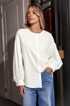 Upgrade your everyday with our White Lantern Sleeve Shirt. The dramatic sleeves add a touch of flair, making this shirt perfect for both work and play. Product code: CAA04D4G015CC Features:  Woven Round neckline Long lantern sleeve Button-front closures Wash Method: Regular Wash Material: 70%POLYESTER,30%RAYON. Daywear Tops With Pleated Sleeves And Button-up Shape, Solid Color Lantern Sleeve Shirt For Fall, Solid Color Lantern Sleeve Fall Shirt, Solid Lantern Sleeve Blouse For Work, Fall Lantern Sleeve Solid Color Shirt, Casual Bishop Sleeve Tops For Work, Fall Lantern Sleeve Shirt, White Tops With Lantern Sleeves And Button Cuffs, Trendy Office Tops With Button Cuffs