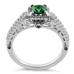 Top of ring height: 7.4mm

    Top of ring width: 7.8mm

    Band width: 3.4mm

    Shank width: 1.9mm

  
     Stone material: green & clear cubic zirconia

    Center stone size: 5mm

    Stone shape: princess & round cut

    Center stone carat   weight: .71 ct

    Total number of stones: 77

    Stone setting: prong setting

 
    Metal: 925 sterling silver

    Plating: rhodium plated   (what is rhodium?) What is Rhodium? 
 
  If you're not familiar with Rhodium, it's a r White Gold Cubic Zirconia Emerald Ring Princess Cut, Princess Cut Cubic Zirconia Emerald Ring, Green Cubic Zirconia Princess Cut Jewelry, Cubic Zirconia Emerald Ring With Princess Cut, Princess Cut Cubic Zirconia Emerald Ring For Anniversary, Green Pave Setting Wedding Ring, Princess Cut Cubic Zirconia Emerald Ring With Prong Setting, Anniversary Princess Cut Cubic Zirconia Emerald Ring, Green Cubic Zirconia Emerald Ring Round Cut